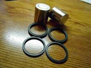 KAWASAKI KFX450 KFX450R KFX 450 FRONT BRAKE CALIPER PISTONS & SEALS KIT 08-14