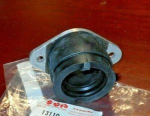 SUZUKI OZARK 250,KING QUAD CYLINDER HEAD CARBURETOR CARB INTAKE BOOT, FLANGE