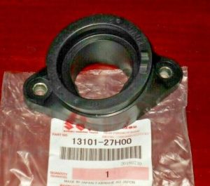 SUZUKI KING QUAD 400 CARBURETOR TO CYLINDER HEAD INTAKE BOOT, FLANGE 13101-27H01