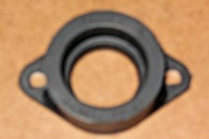 KAWASAKI BAYOU 220, 250 CYLINDER HEAD CARBURETOR INTAKE BOOT, FLANGE 16065-1157
