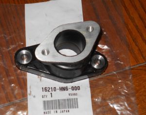 HONDA RECON 250,TRX 250EX,250X CARBURETOR INTAKE BOOT FLANGE 16210-HN6-000