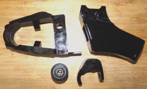 HONDA TRX250R SWINGARM CHAIN SLIDE, ROLLER, REAR GUIDE, LOWER FRAME RUB BLOCK