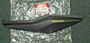 HONDA GROM 125, LEFT REAR BODY PANEL,COWL ,NEAR BACK OF SEAT 77220-K26-B40ZC